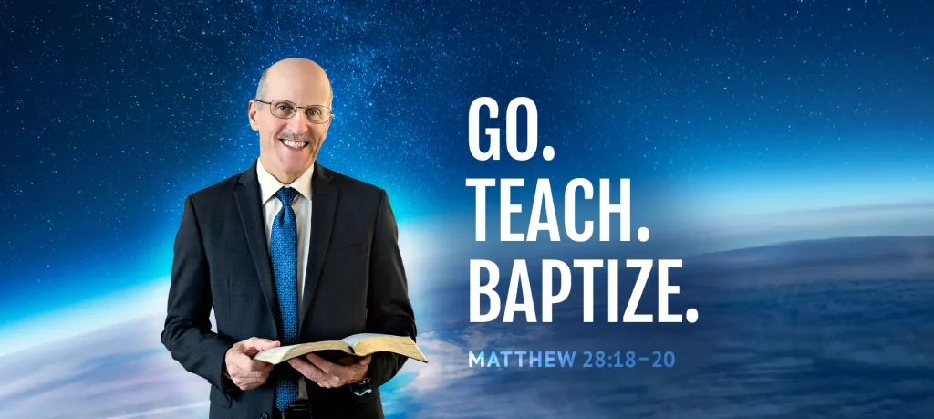 Pastor Doug holding a bible