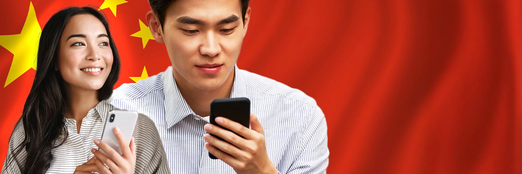 Two young adults, a man and a woman, are using smartphones against a backdrop of the Chinese flag. The woman is smiling while looking off to the side, and the man is focused on his phone. Both are dressed in casual business attire.
